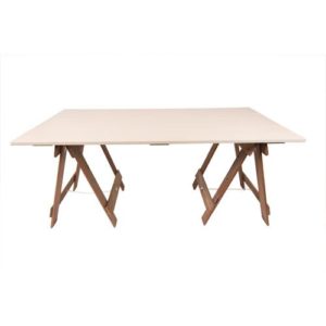 Cream trestle table top on brown timber trestle legs