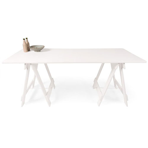 painted white timber trestle table with white painted timber legs