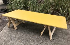 Yellow trestle table top on plywood boho style trestle leg