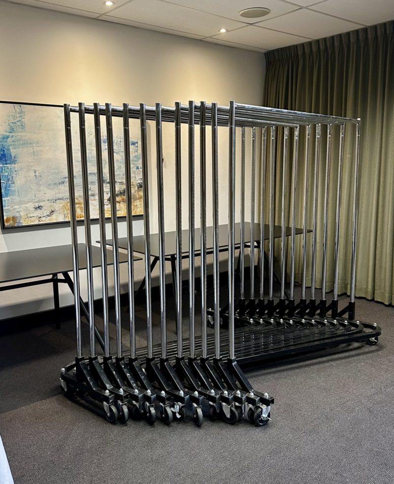 Heavy Duty clothing racks together in a sydney apartment room